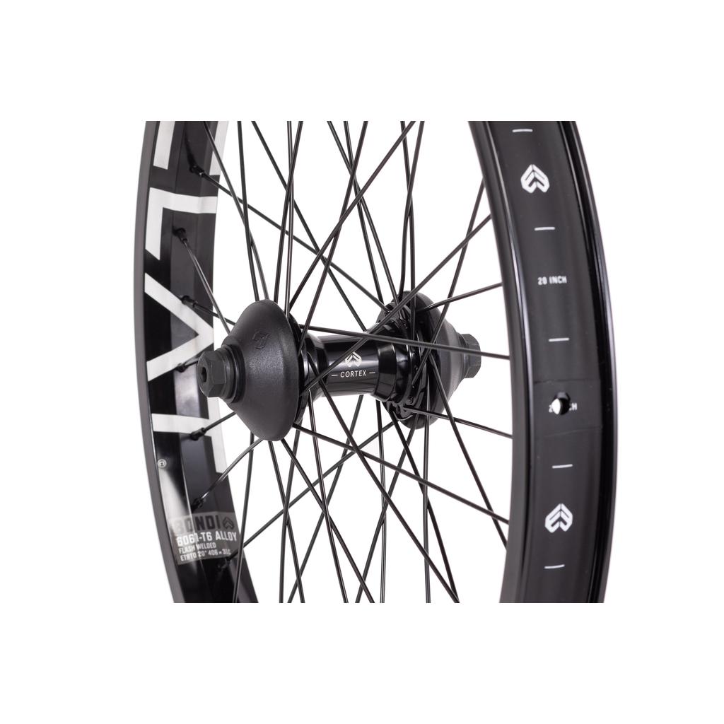 Close-up of the Eclat Cortex X Bondi Logo Front Wheel, a black 20-inch BMX wheel with metal spokes, an "Eclat Cortex" hub, and the Bondi Logo on the rim.