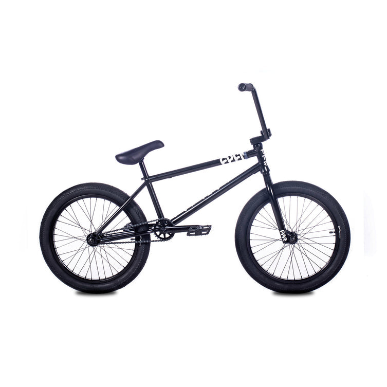 The Cult Control 20 Inch Bike BMX, featuring a black Chromoly frame, single gear, thick tires, and straight handlebars, is displayed against a plain white background.