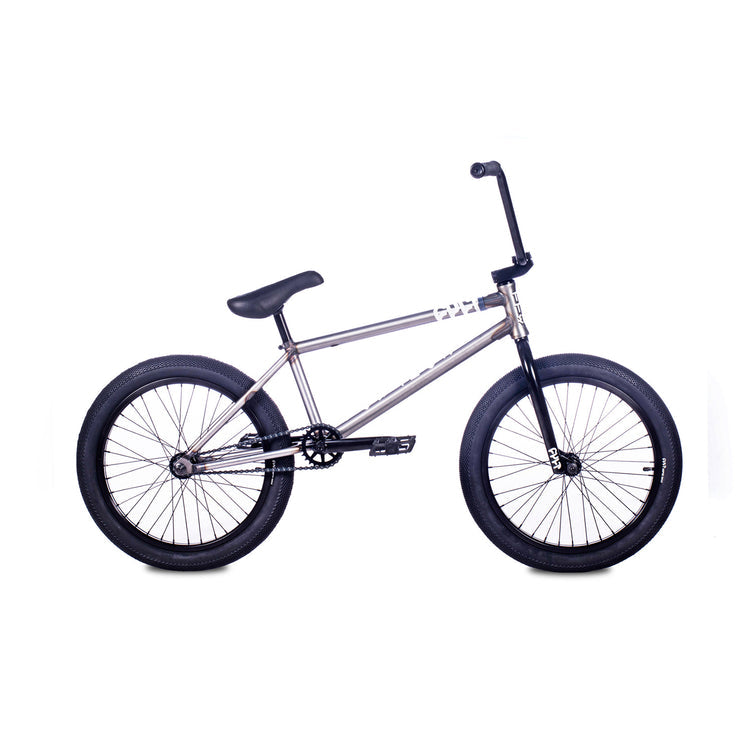 The Cult Control 20 Inch Bike features a metallic frame, black handlebars, black seat, and black tires, shown in a side view against a white background.