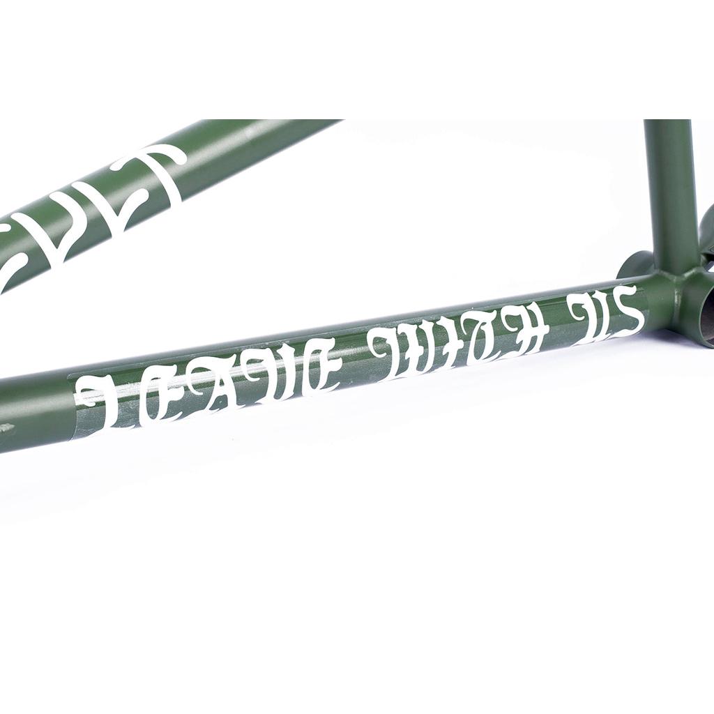 Close-up of the Cult Heavens Gate Frame (Brandon Begin Signature) in green with white gothic text "HEAVEN WITH US," ideal for technical street riding.