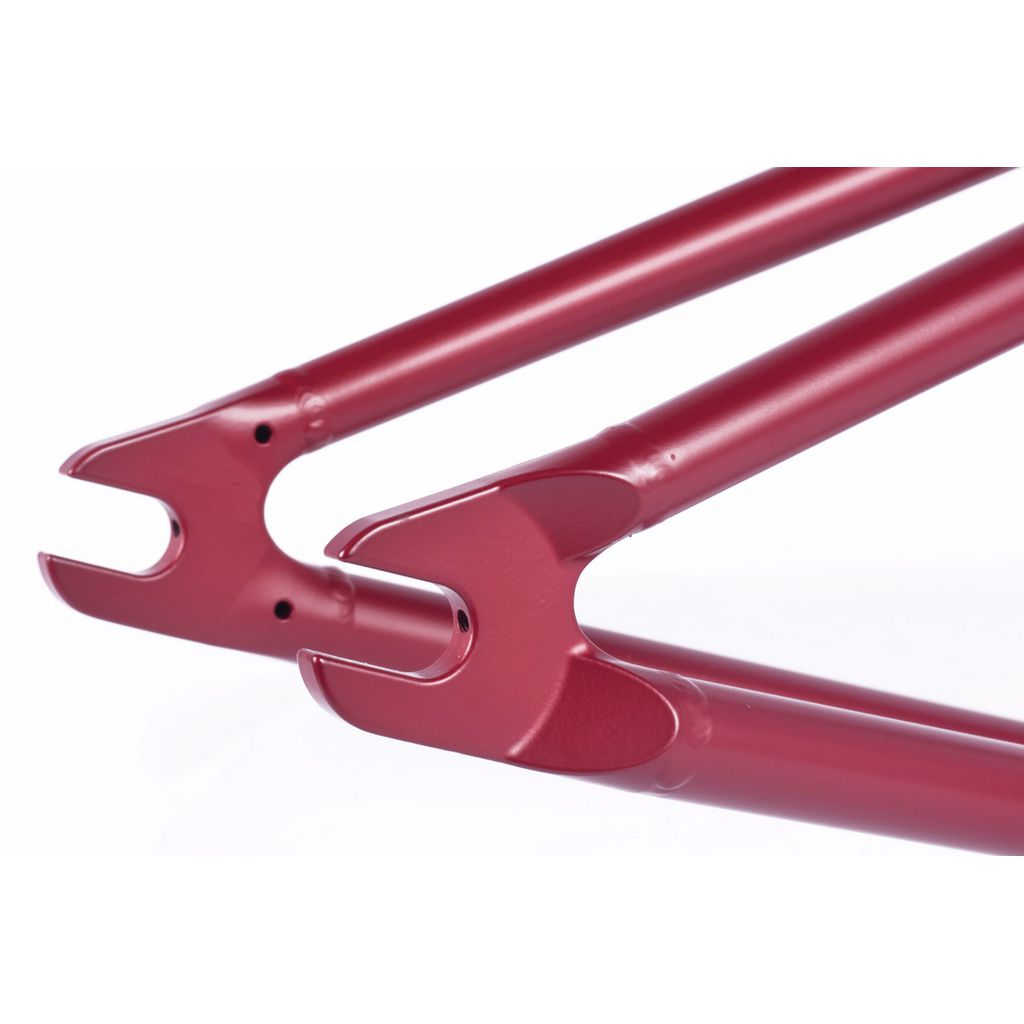Close-up of the Cult Heavens Gate Frame (Marcel Anderson Colourway) rear dropouts, featuring clean welds and a glossy red finish adorned with subtle Spiderman graphics against a white background.