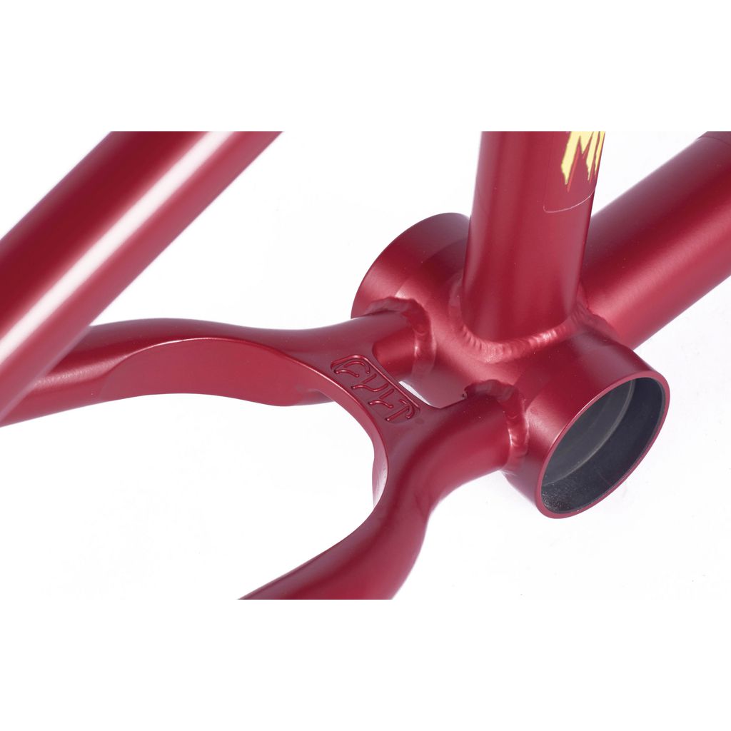 Close-up of the bottom bracket area on the Cult Heavens Gate Frame (Marcel Anderson Colourway), showcasing smooth welds, the manufacturer's logo, and subtle Spiderman graphics.