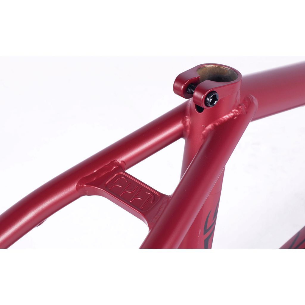 Close-up of a Cult Heavens Gate Frame (Marcel Anderson Colourway), showcasing a detailed weld and bolt connection at the seat post, enhanced with subtle Spiderman graphics.