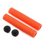 Two orange Cult Solo Grips with a ribbed design, inspired by Sean Ricany, come with two black end caps and are displayed on a white background.