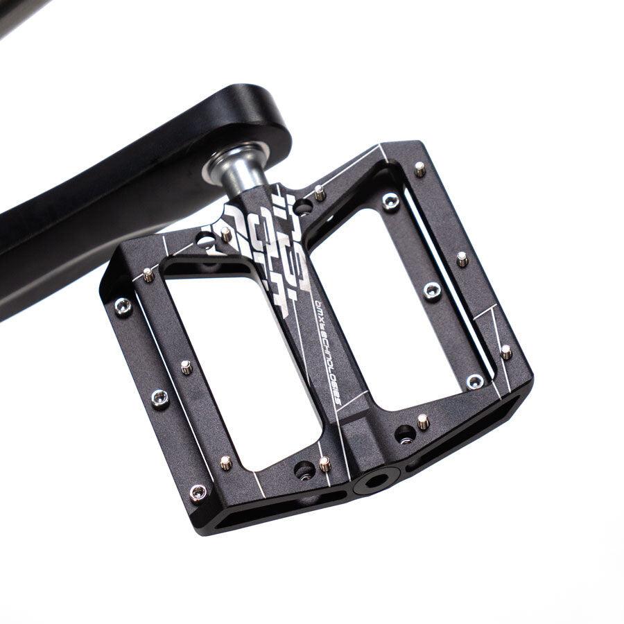 A close up image of the Cult Vick Behm Custom Race Bike pedal.
