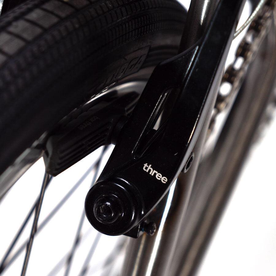 A close up of the Cult Vick Behm Custom Race Bike's brakes.