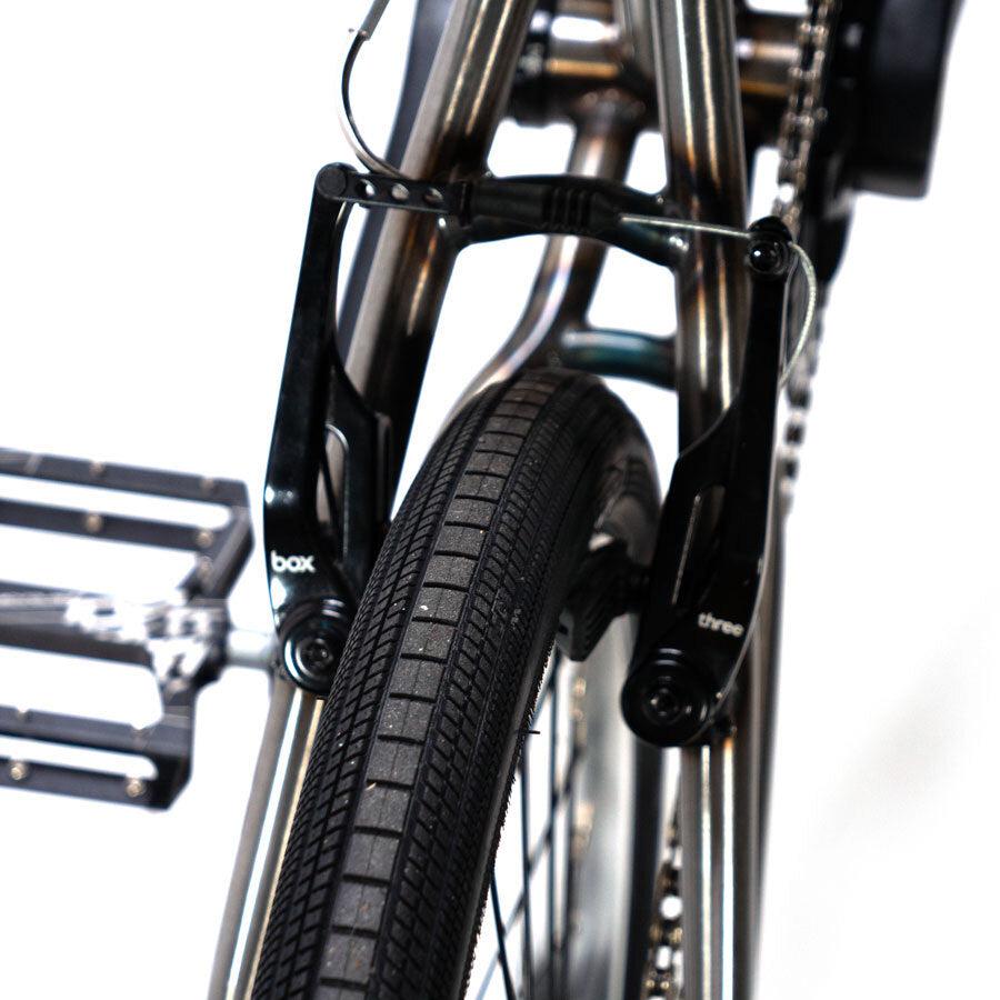 A Cult Vick Behm Custom Race Bike with a tire attached, showcasing exceptional performance.