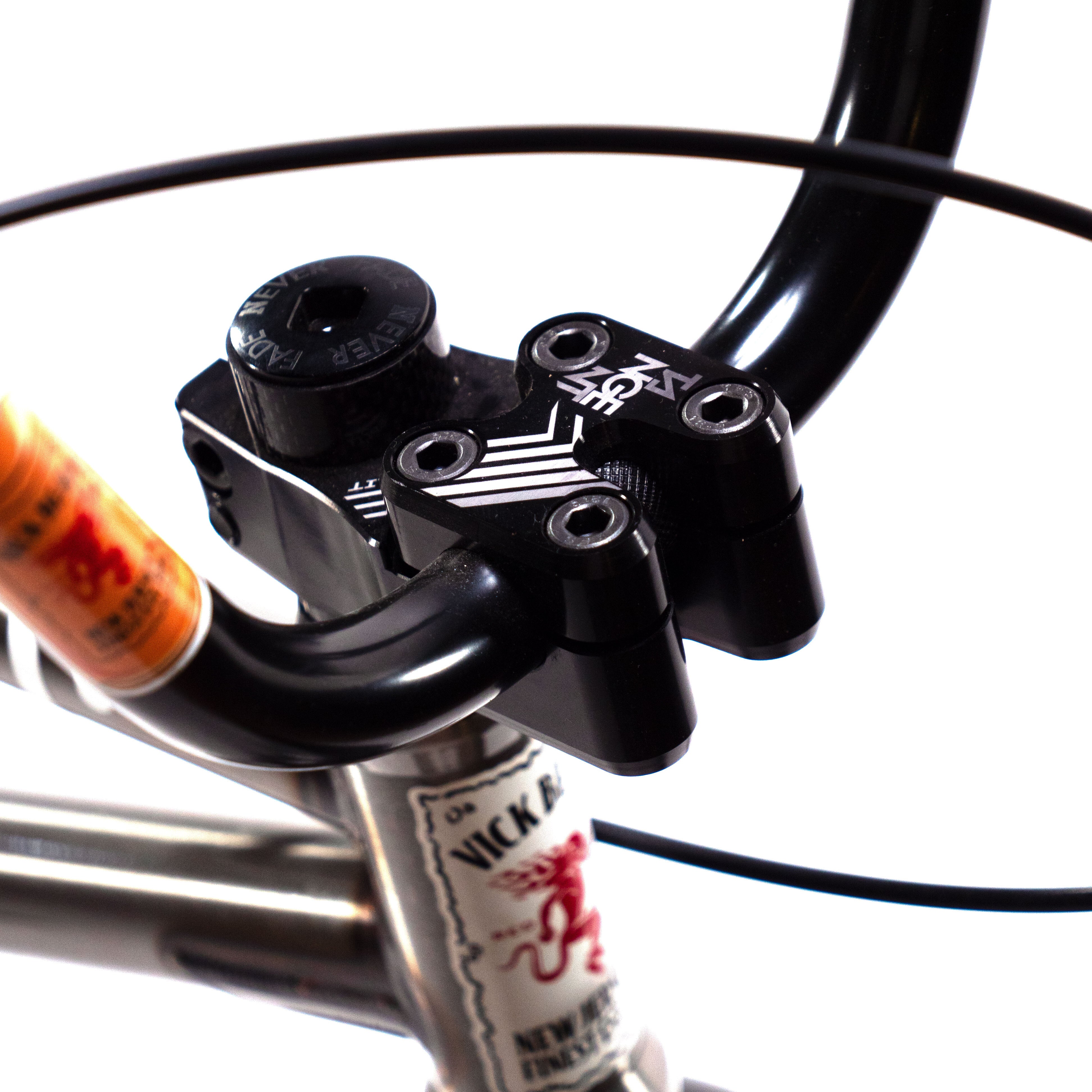 A close up of a handlebar on a Cult Vick Behm Custom Race Bike.