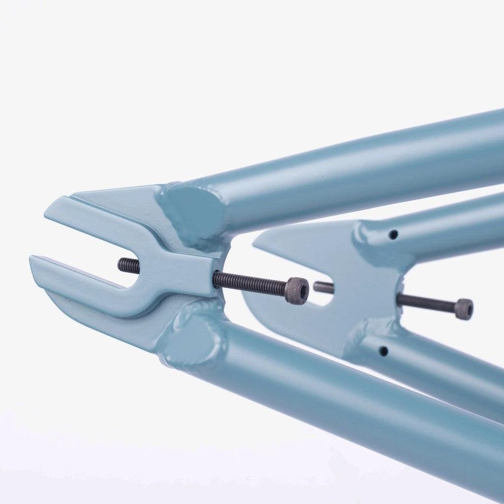 A close up of the Cult Vick Behm Race Frame, which showcases its light weight and strength, featuring the signature of Vick Behm.