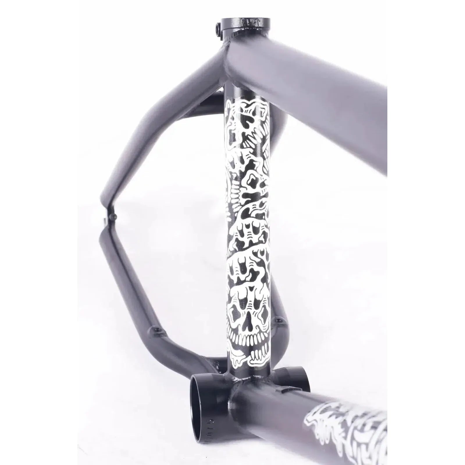 The Cult Walsh Frame (Corey Walsh Signature) boasts a black design with white skulls on the vertical tube, matching its rebellious spirit. The investment cast dropouts guarantee durability and precision, all showcased on a white background, perfect for adventure and Corey Walsh style.