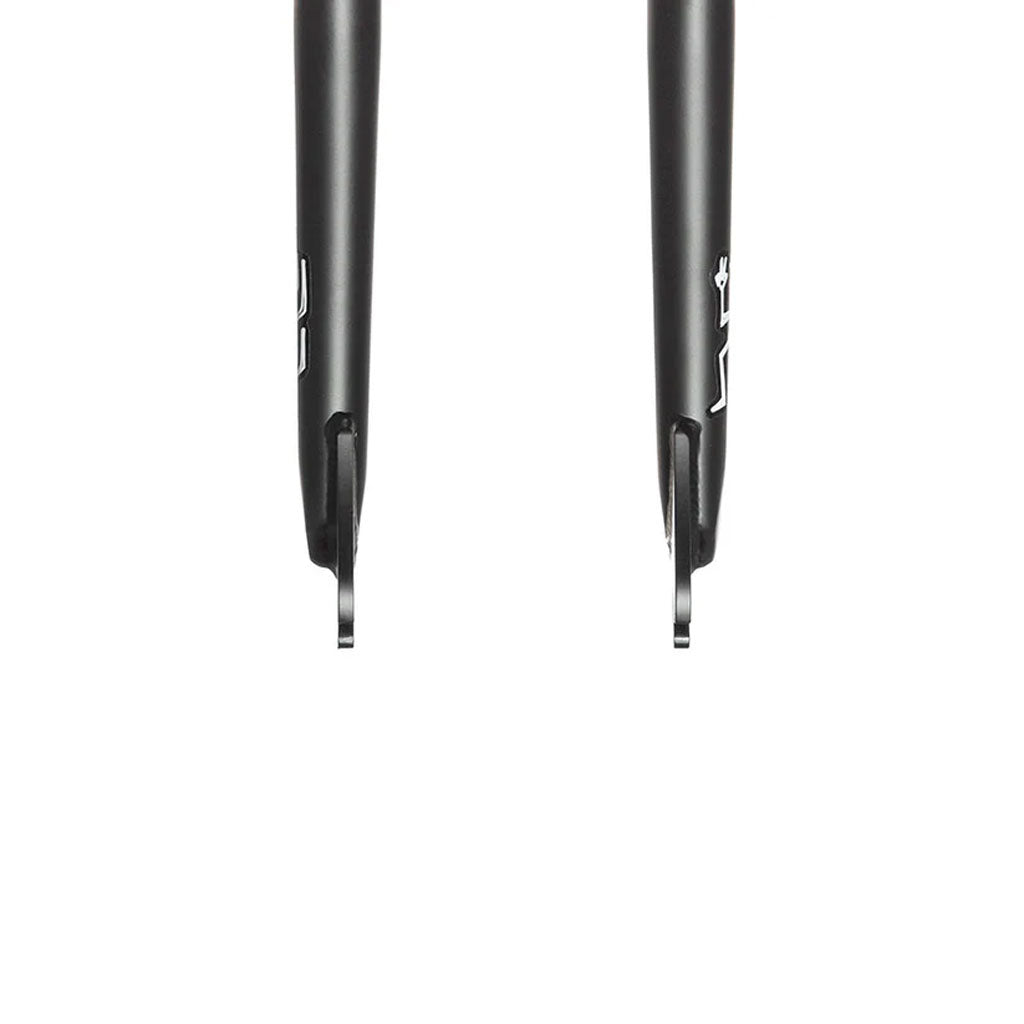 Close-up of the Demolition (Kevin Peraza) Kp Fork showcases minimalist black heat-treated CR-MO dropouts against a white background, with partially visible side branding.