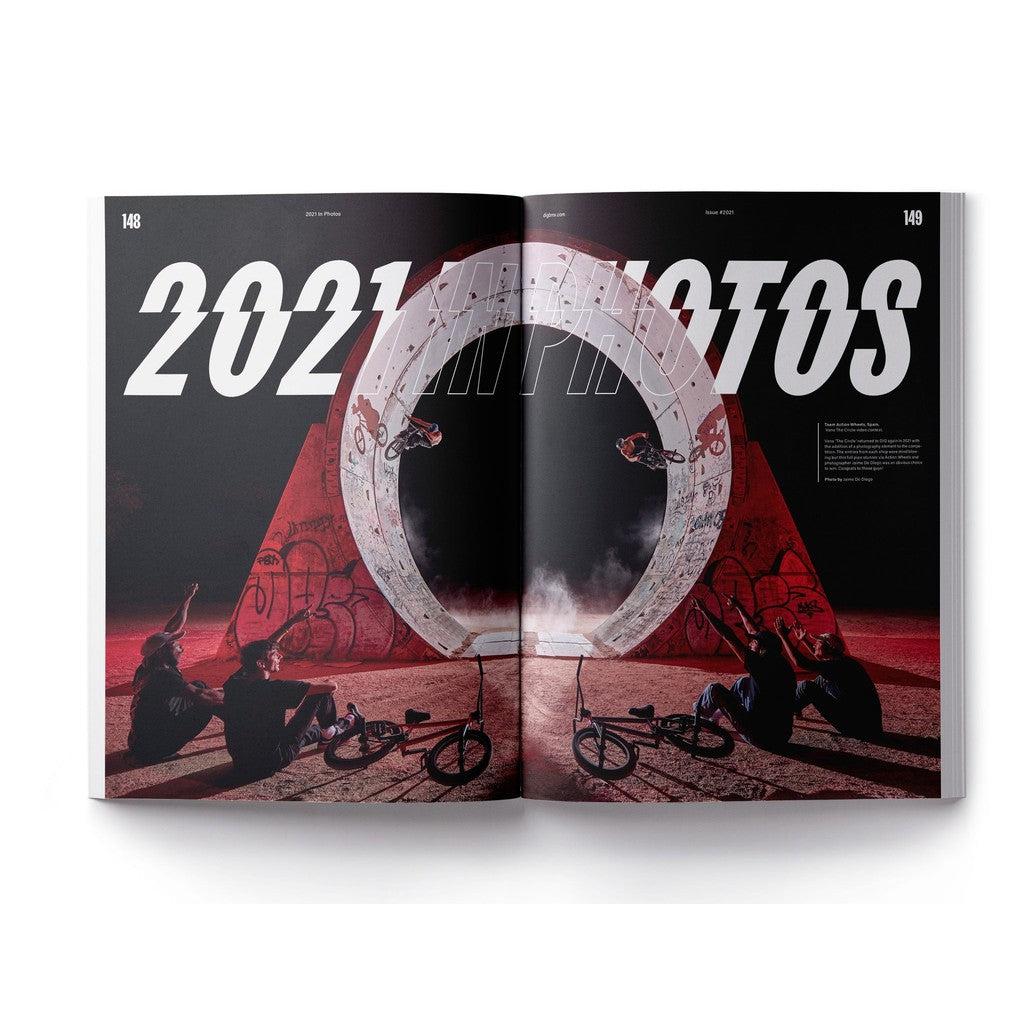 A DIG Book 2021 - Photo Annual featuring a photo of a man riding a bike at the Swampfest in issue #2021.