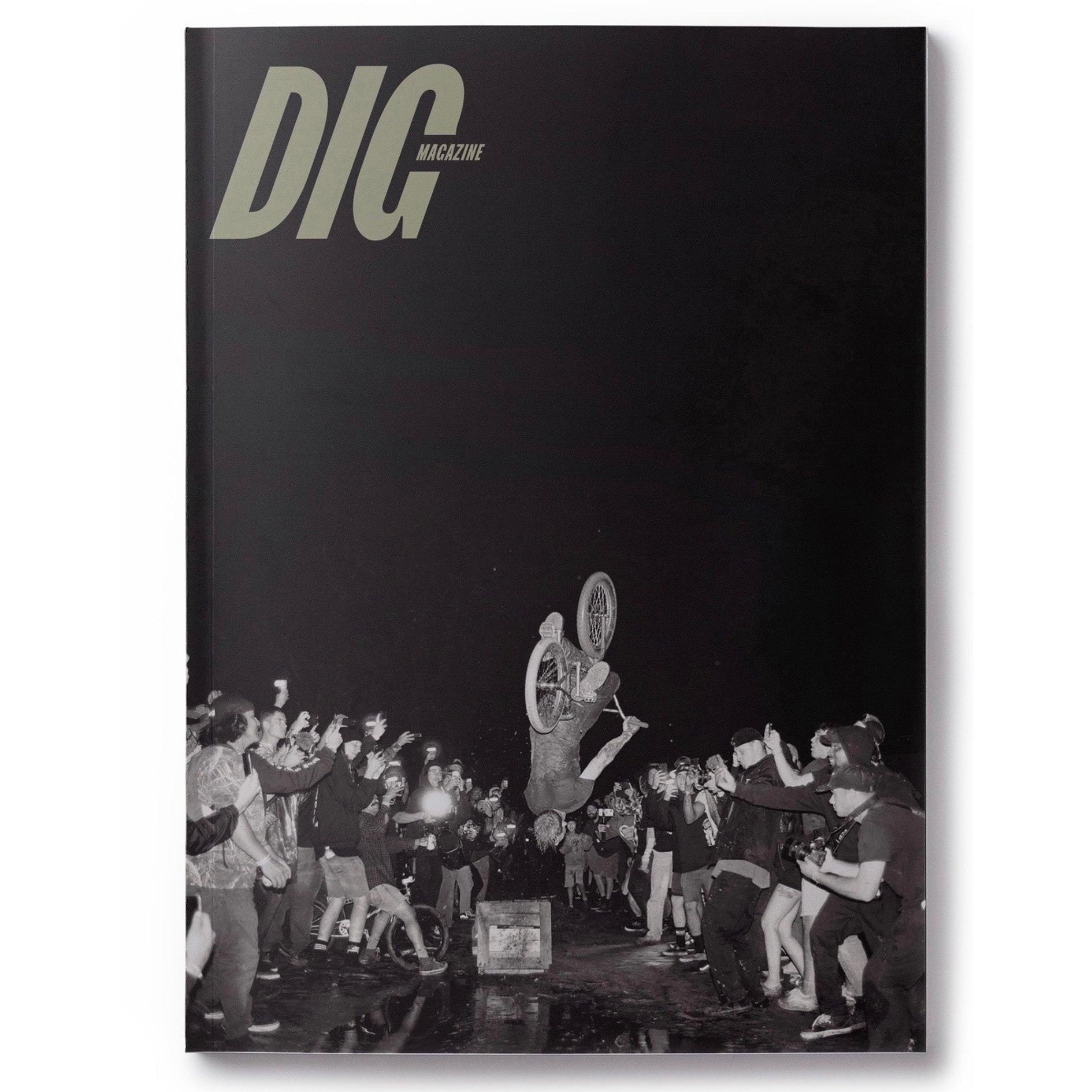 The cover of DIG Book 2021 - Photo Annual featuring a man riding a bike at Swampfest, issue #2021.