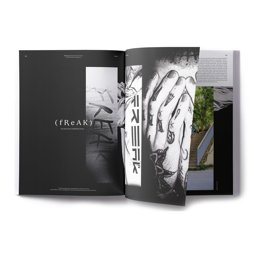 A black and white spread of DIG Book 2023 - Photo Annual with an image of a hand. Issue #2023 features photography by a BMX photographer.