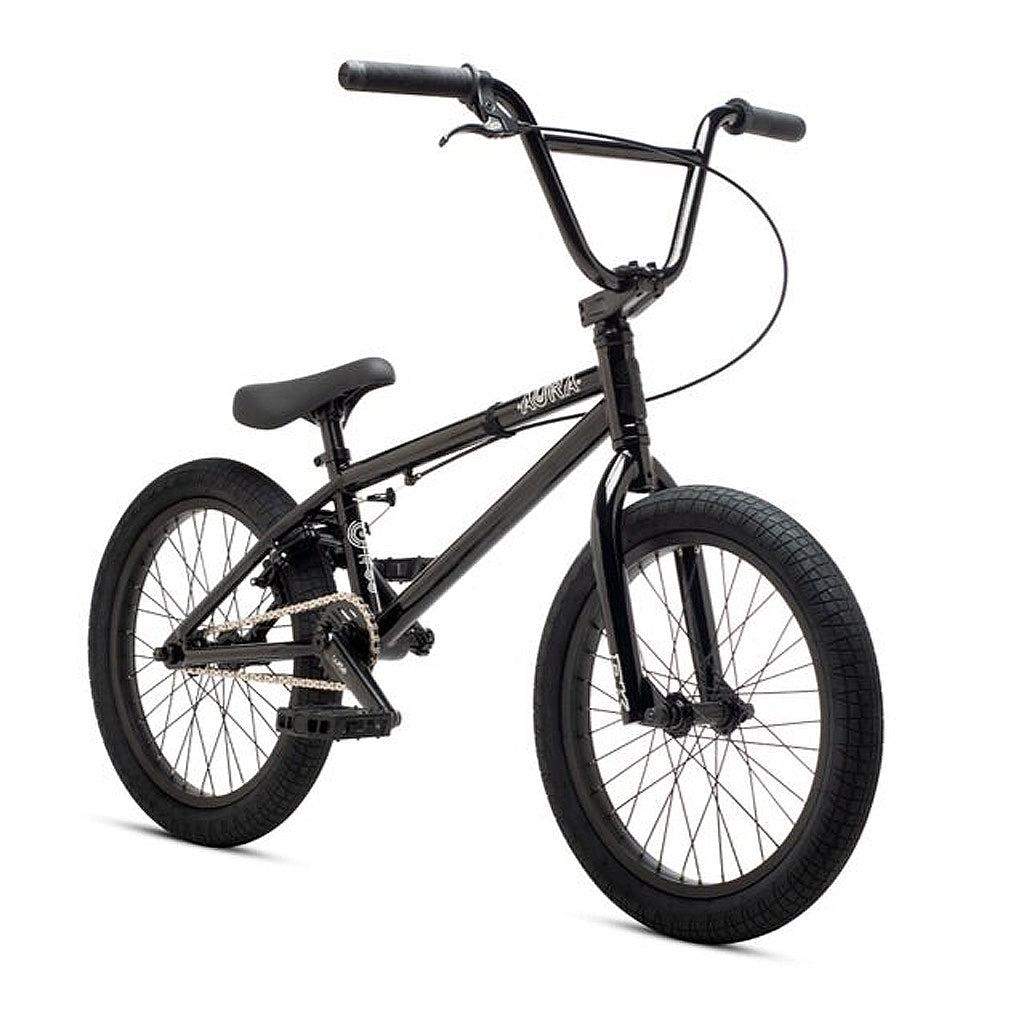 A black DK Aura 18 Inch Bike with 18 inch wheels on a white background.