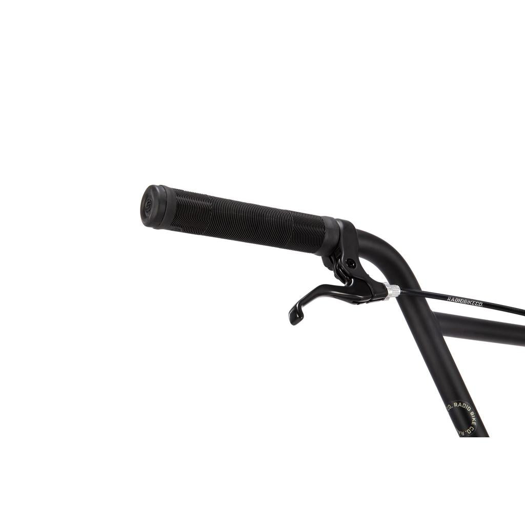 Close-up of the Radio Evol XL 20 Inch Bike's black BMX handlebar featuring a textured grip and brake lever against a white background—perfect for entry-level riders.