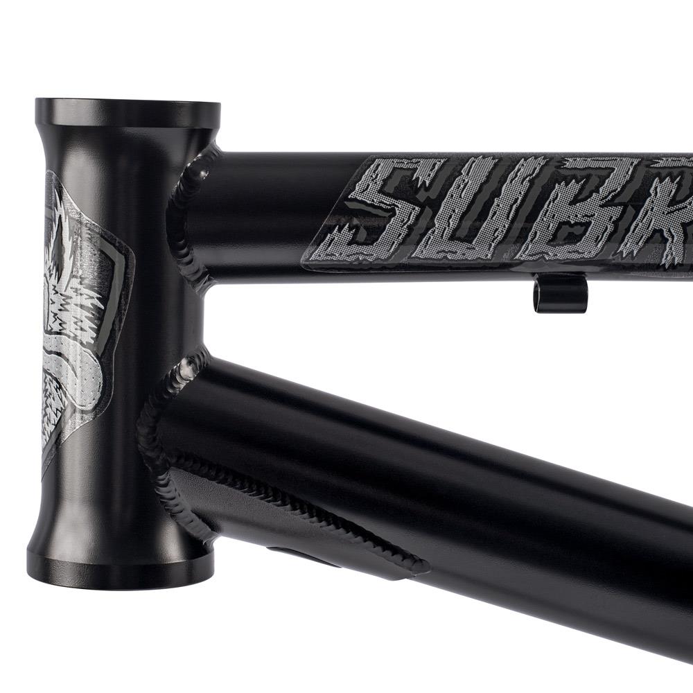 Close-up of the Subrosa Speedwolf V2 Race Frame, featuring a black Chromoly build with silver decals and visible welds at the head tube and top tube junction—ideal for BMX racing enthusiasts.