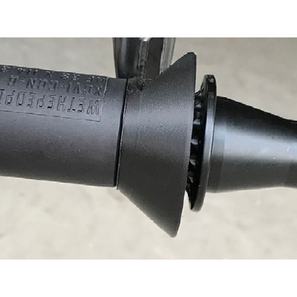 Close-up view of the Eclat Overguard Front Nylon Universal Hub Guard, showcasing its connection and securing mechanism with a universal fit.