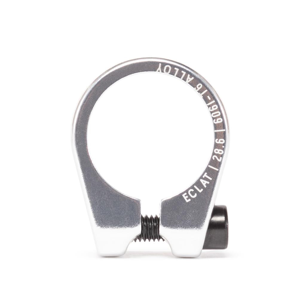 The Eclat Pure Seat Clamp, made from durable 6061-T6 alloy, includes a bolt and "Eclat" engravings with size info. This lightweight clamp offers secure fastening with stylish reliability.