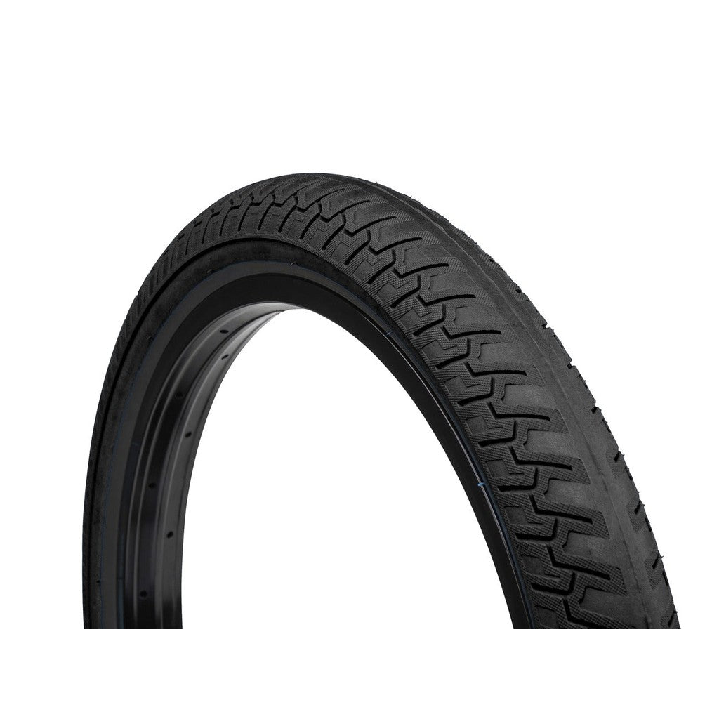 Close-up view of a black Eclat Ridgestone Slick Tyre (Each) with a textured tread pattern against a white background.