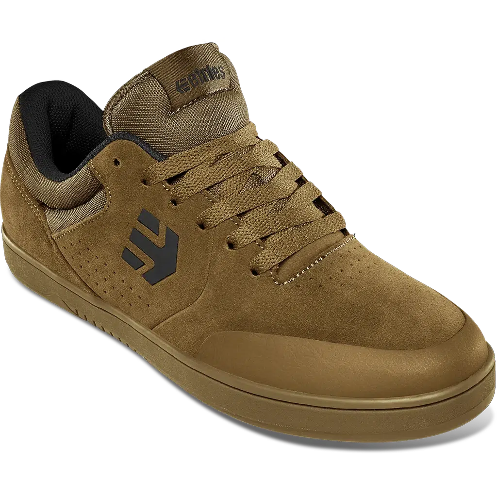 The Etnies Marana Michelin Shoe in Brown/Black/Gum showcases black accents, perforated side details, and matching laces, tailored for skateboarders. It features Michelin performance rubber for increased durability and grip.