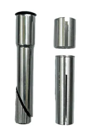 The Quill to A-Head Stem Adapter Kit includes three metal bushings—perfect for converting threadless or quill stems on vintage bikes—shown on a white background, with two arranged vertically at right and one at left featuring a slanted cut.