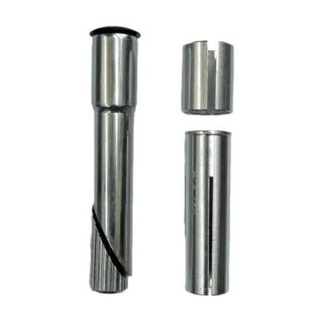 The Quill to A-Head Stem Adapter Kit includes three metal bushings—perfect for converting threadless or quill stems on vintage bikes—shown on a white background, with two arranged vertically at right and one at left featuring a slanted cut.