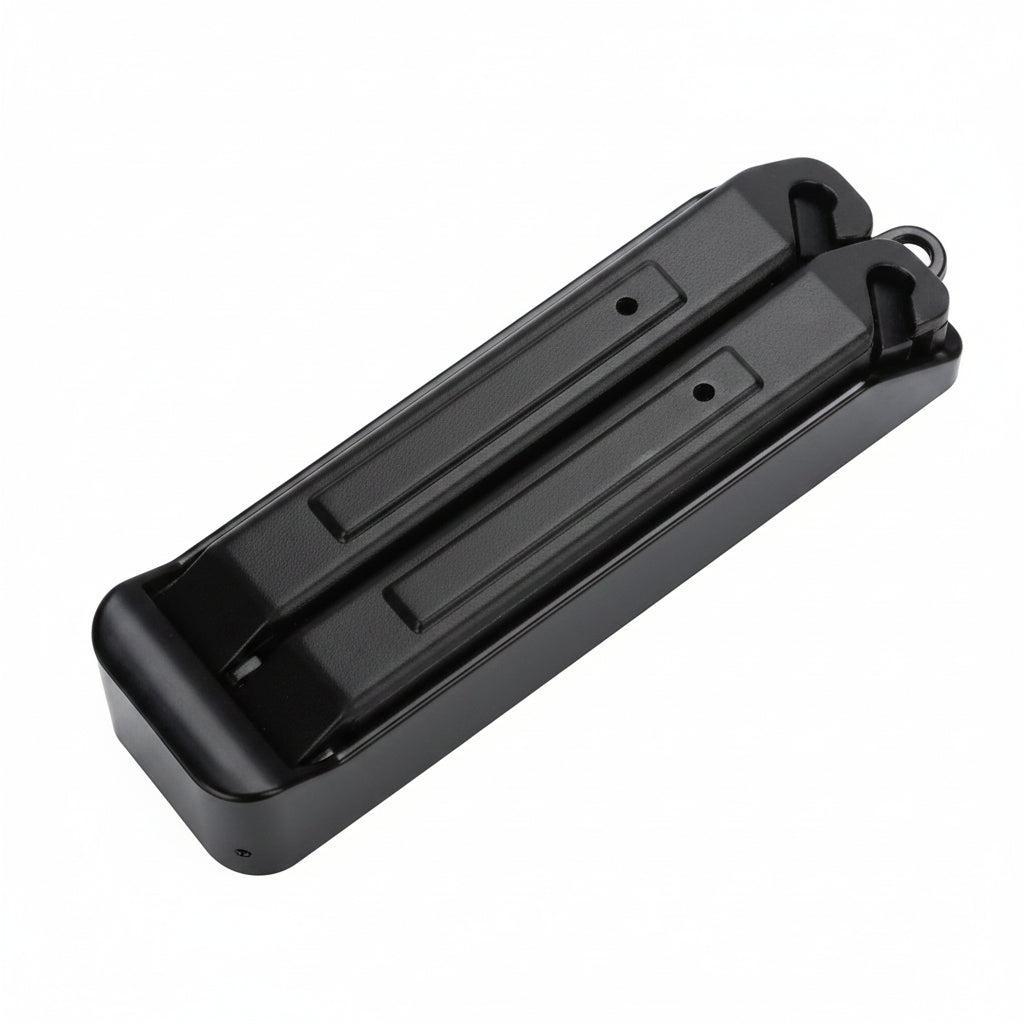 The Puncture Repair Kit includes a handheld knife sharpener with two red sharpening rods and a black plastic base—perfect for keeping your tools in top condition when prepping gear or using tyre levers.