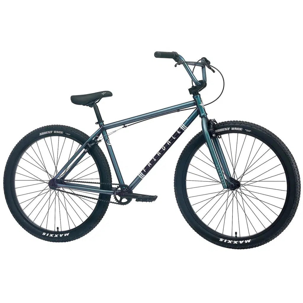 The Fairdale Taj 27.5 Inch Bike (2022) features a chromoly frame for durability, thick tires, a black seat, and a straight handlebar in an eye-catching teal and black color scheme.