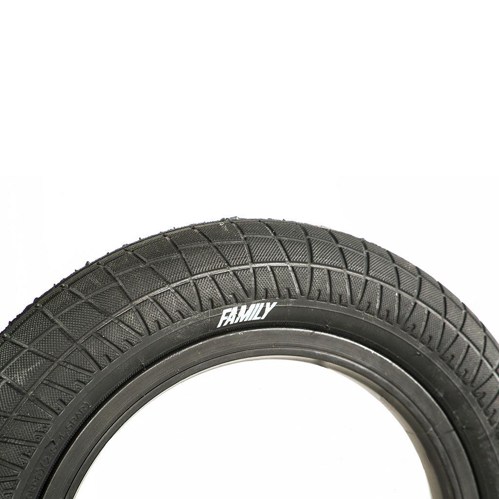 A black Family BMX F2128 12 Inch Tyre on a white background.