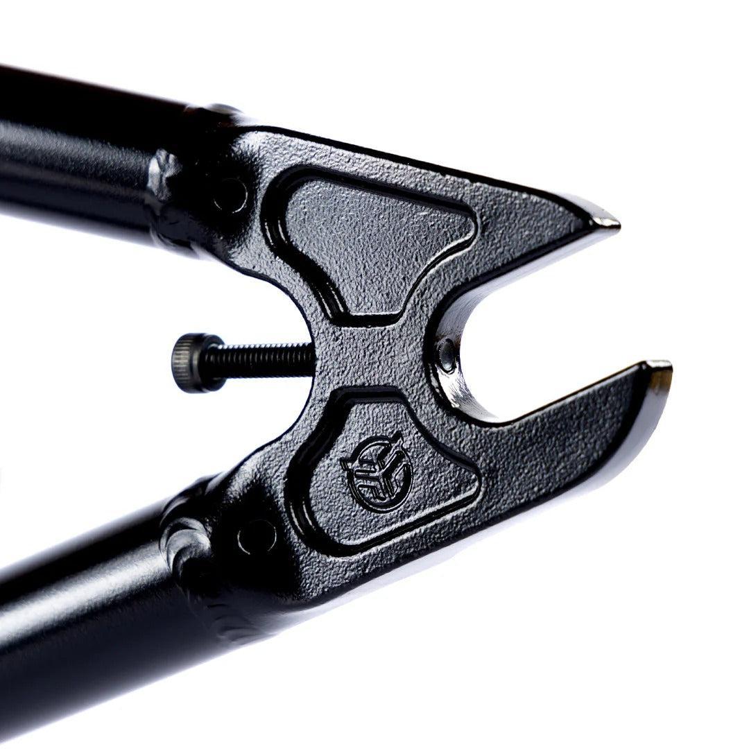 Close-up of the Federal Team ICS2 Frame’s black fork dropout with tensioning screw, made from durable 4130 Chromoly tubing, shown on a white background—perfect for technical street riding.