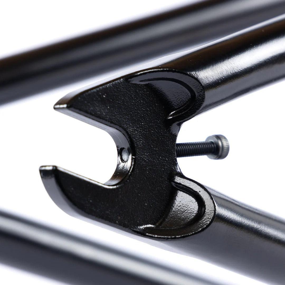 Close-up of the Federal Team ICS2 Frame dropout with bolt installed, highlighting its smooth metallic finish and precise build—crafted from 4130 Chromoly tubing for technical street riding.