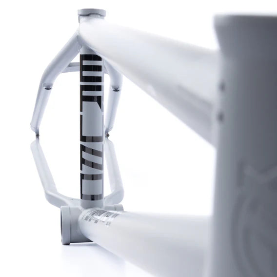 Close-up view of the Federal Bruno ICS2 Frame in white, showcasing the seat tube, bottom bracket, and part of its geometric design crafted from 4130 Chromoly.