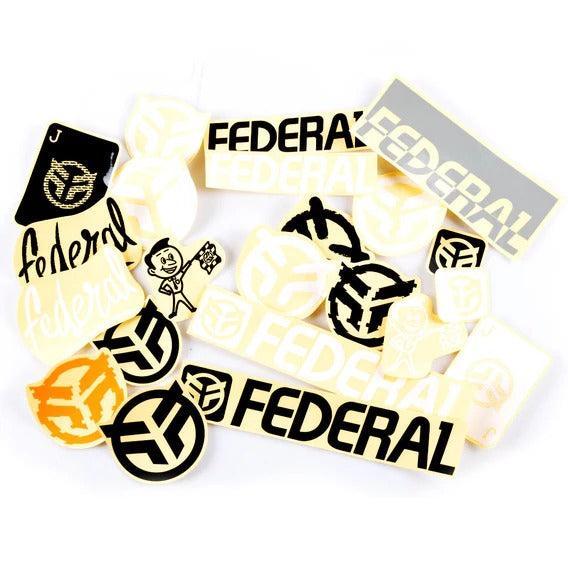 The Federal 22pc Sticker Pack features a mix of Federal Bikes stickers in various shapes, sizes, and colors, ideal for frame graphics, displayed on a white surface.