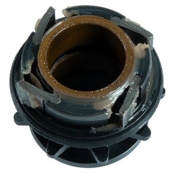 A close-up of the Federal Stance Pro Cassette Driver showing its bearing assembly with brown grease and black plastic parts.
