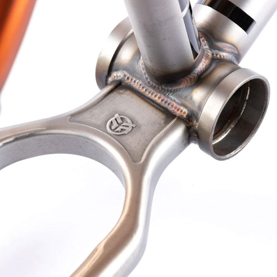 A close up image of a bicycle handlebar with a Federal Bruno Frame.