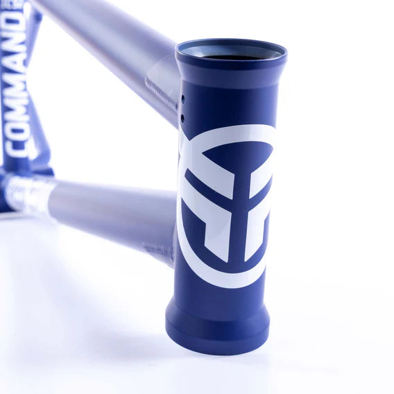 Close-up of a blue Federal Command ICS2 Frame made from 4130 Chromoly, featuring a white logo with "COMMAND," highlighting its sleek design.