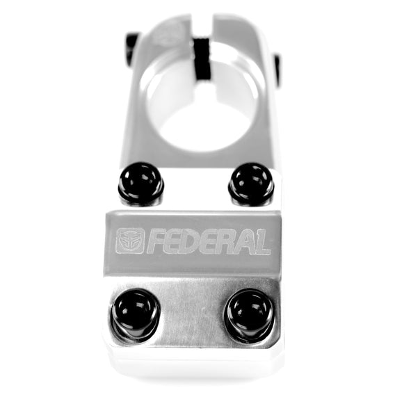 Close-up of an aluminum Federal Element V2 Top Load Stem with bolt attachments, engraved with the brand name.