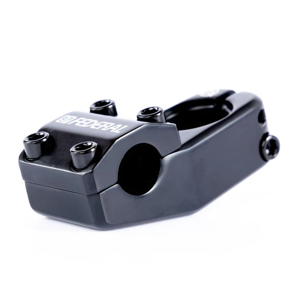 The Federal Element V2 Top Load Stem, available in a sleek black finish, showcases a top load design with four bolt holes and a prominently displayed brand logo. Made from cold forged 6061 aluminum, it provides durability and style for any rider.