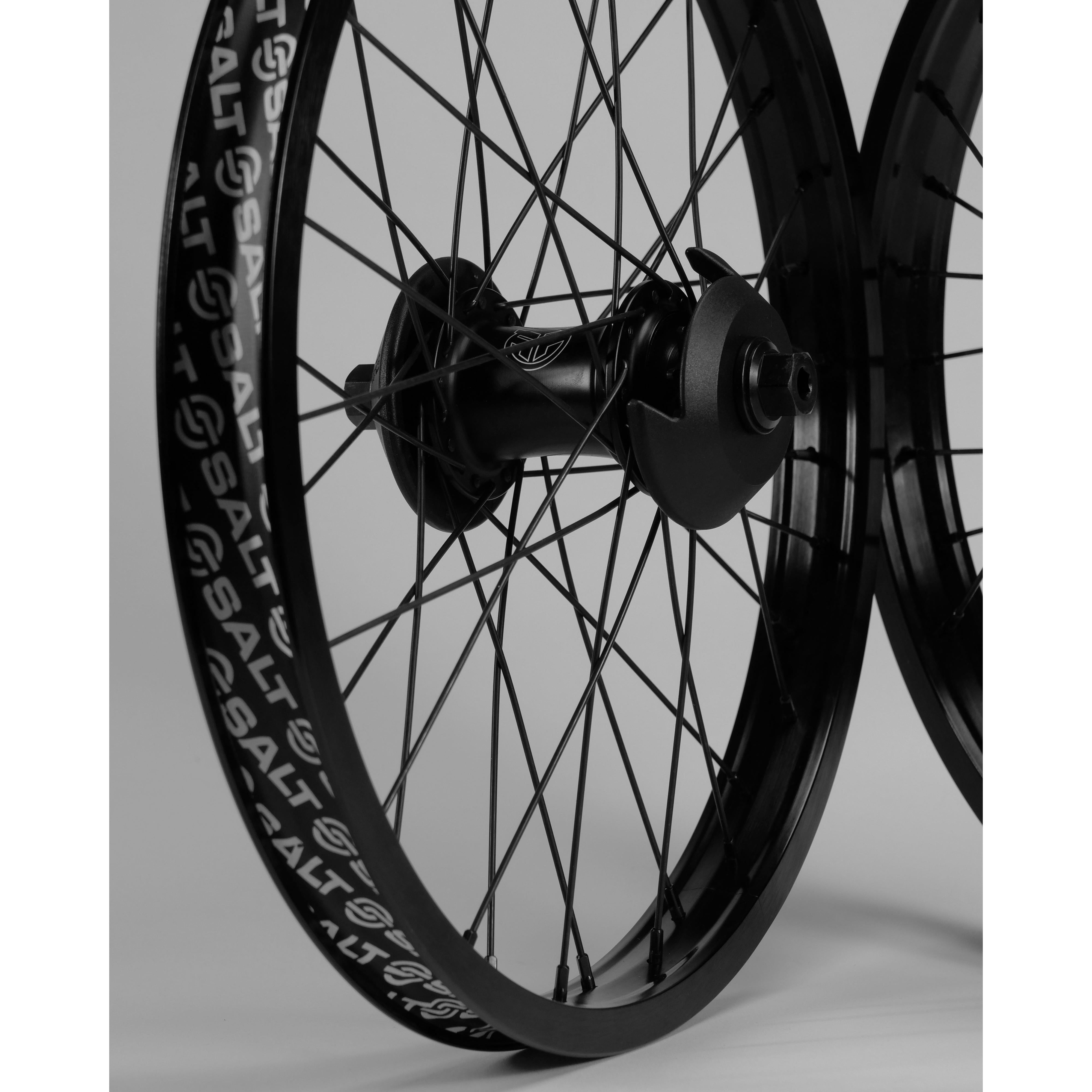 Two Federal Stance Pro x Alienation 18 Custom Wheelsets with intricate spokes and branded tire sidewalls, set against a plain background.