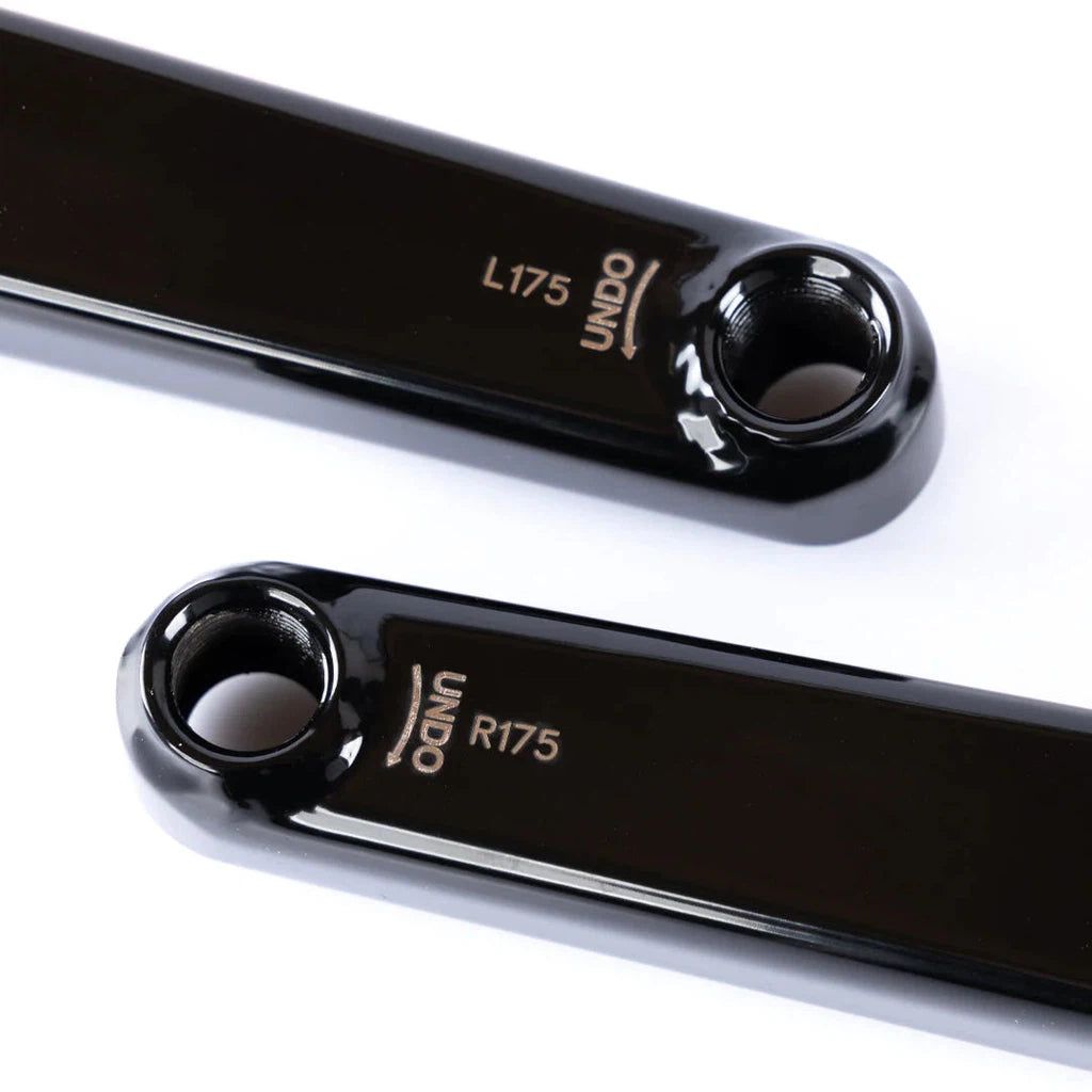 Two black handlebars with Federal Vice 2 Cranks / 24mm on a white surface.
