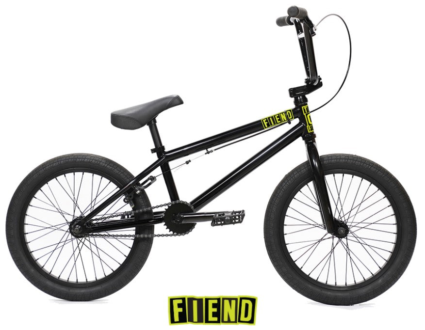 Side view of a black Fiend Type O 18 Inch Bike (2026) with yellow FIEND branding on the chromoly frame and a matching FIEND logo displayed below the bike.