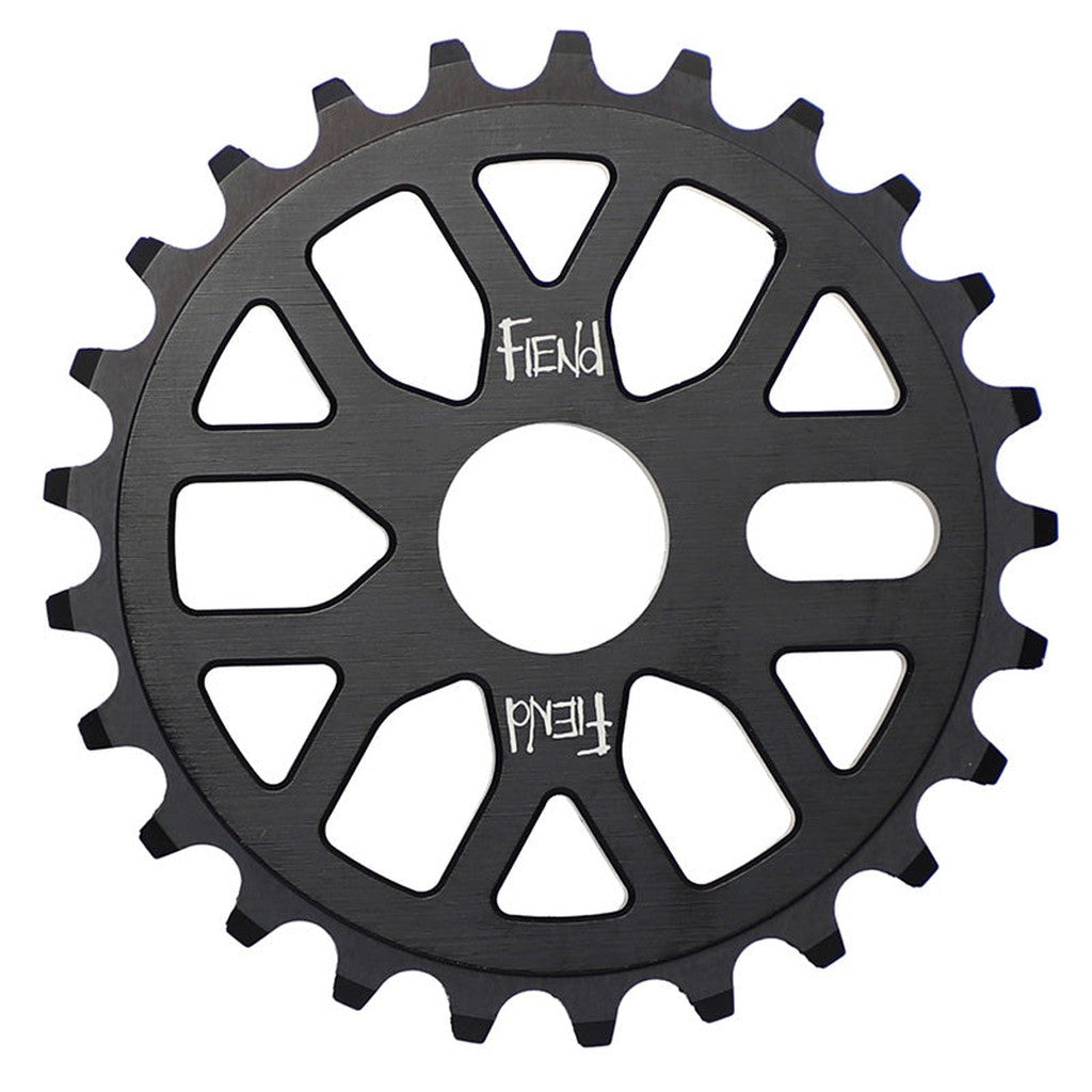 Fiend Omicron Sprocket with the word "fiend" engraved in the center, featuring a circular design CNC machined from 6061 aluminium, with multiple teeth around the edge.