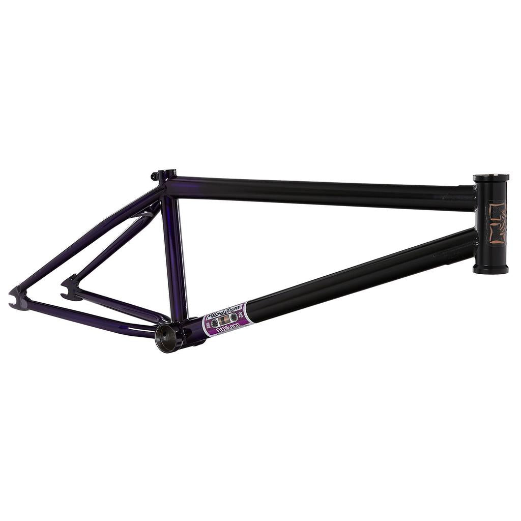The Fit Bike Co Mixtape Frame (Matt Nordstrom Signature) is displayed with a black and purple finish, showcasing its street frame design and responsive geometry from a side angle against a white background.