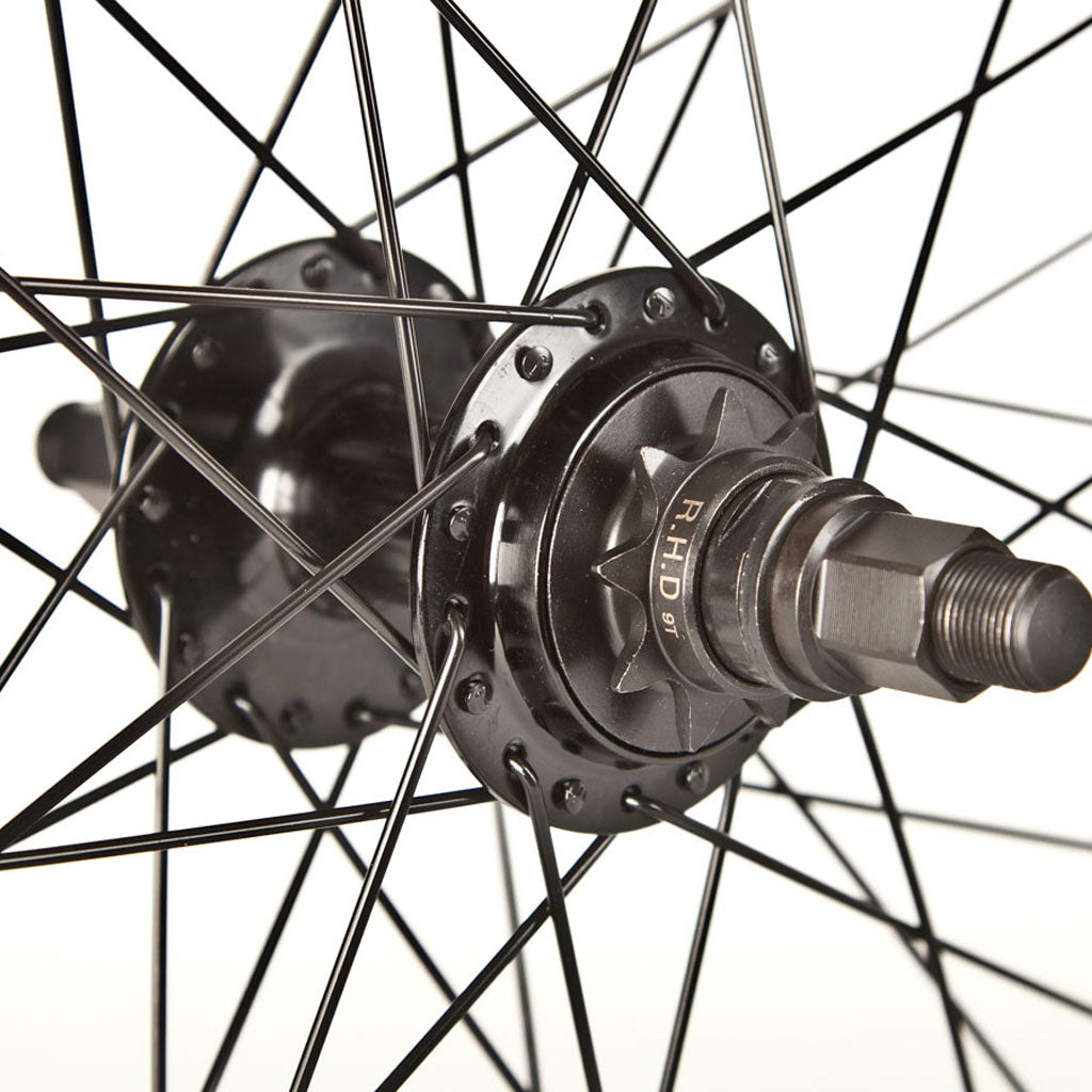 A close up of a bicycle wheel with spokes featuring the Fit Bike Co OEM 20 Inch Wheel Set.