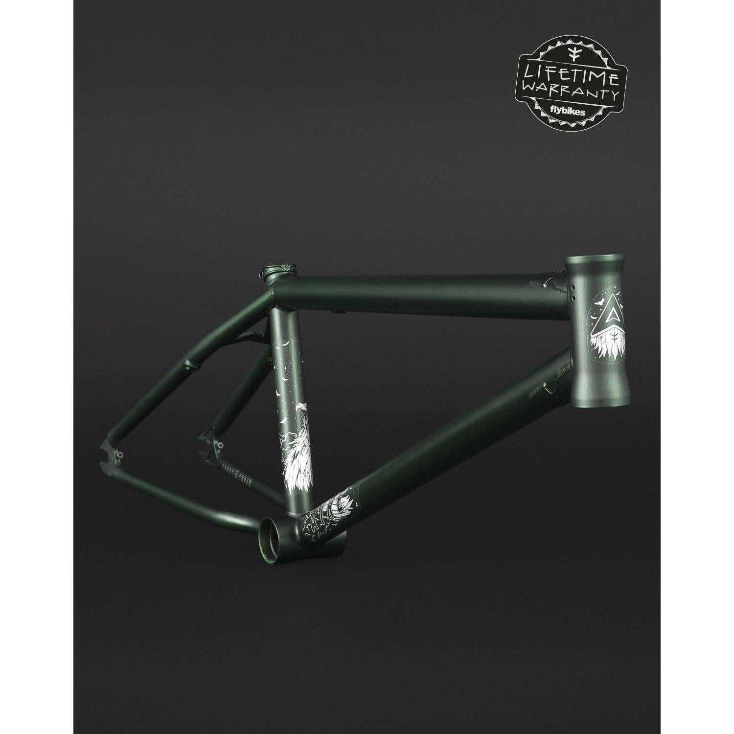 The Fly Bikes Aire Frame, made from 4130 Cr-Mo steel in matte black with graphic designs, is displayed against a dark background. The "Lifetime Warranty" logo appears prominently in the top right corner.