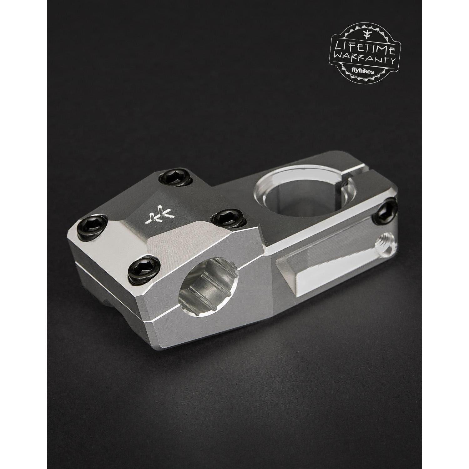 The Fly Bikes Volcano 25 Stem (S), CNC machined from 6061-T6 aluminum, features a sleek silver finish with black bolts on a dark background. The logo and "Lifetime Warranty" are displayed prominently in the corner.