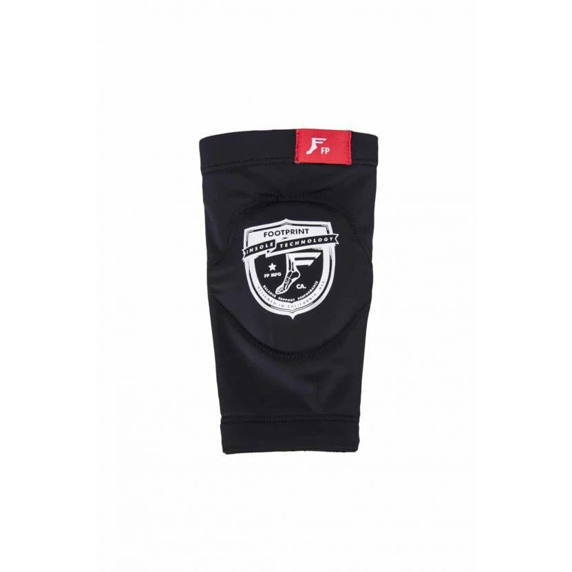 Black knee guard with a white and black circular logo in the center and a red FP label at the top, offering low profile protection for optimal performance.