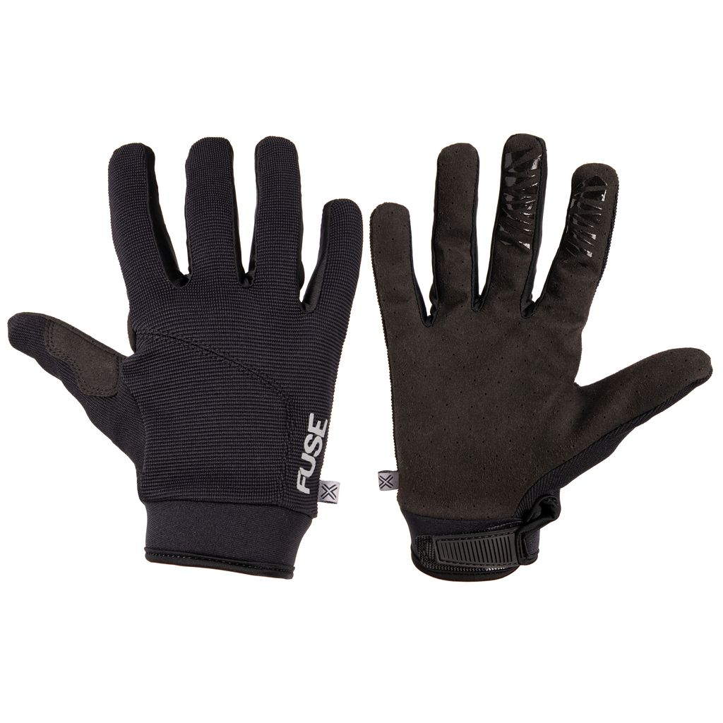 Fuse Alpha Youth Gloves in black feature one glove exhibiting the back with the ALPHA logo, while the other reveals the palm side equipped with silicone grips, a Velcro strap, and a reinforced thumb for enhanced durability.