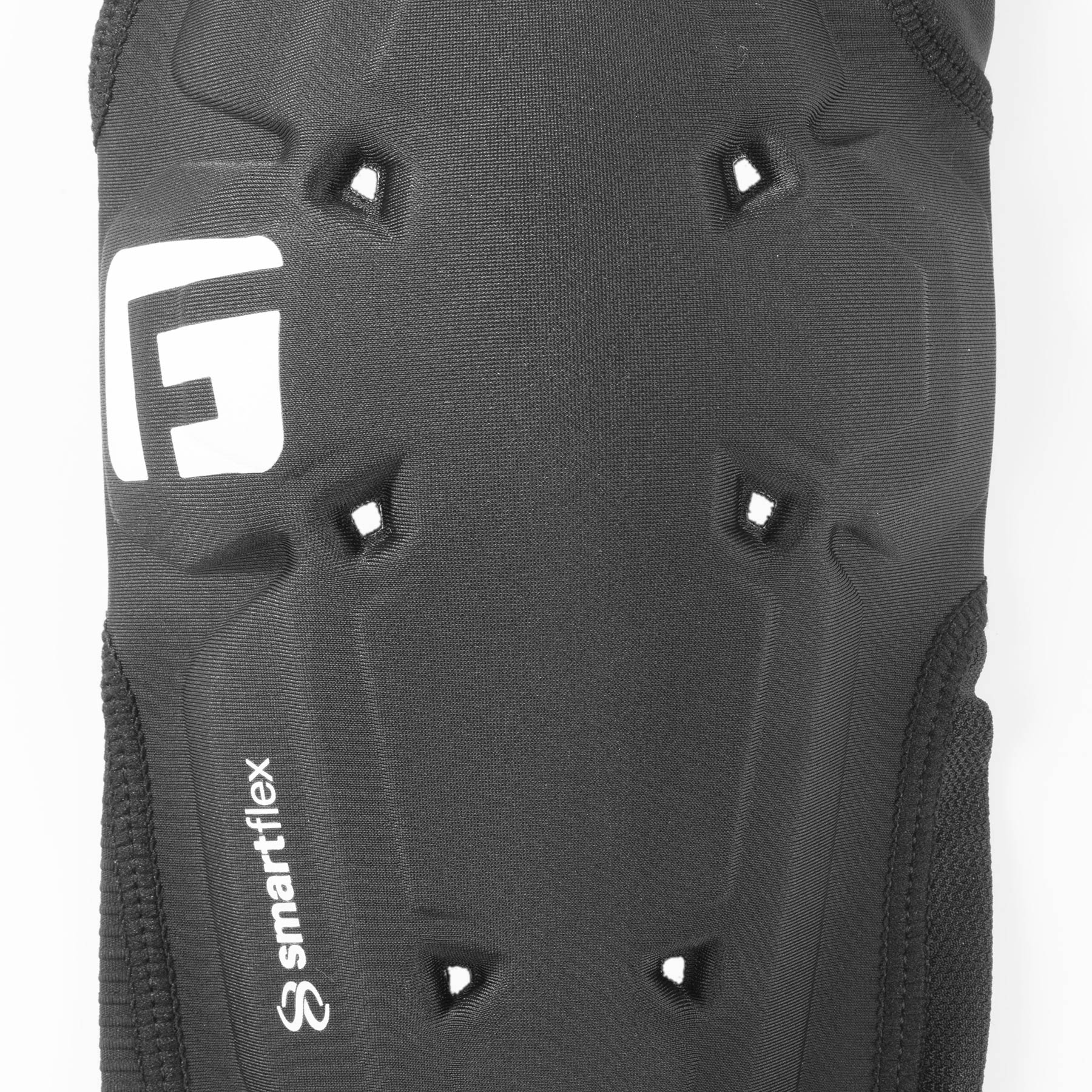 Close-up of a black G-Form X4 Elbow Guard with "G-Form" and "SmartFlex" logos on its breathable compression fabric.